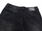 Sunfaded black heavyweight baggy denim with chrome leather back patch by WOJO