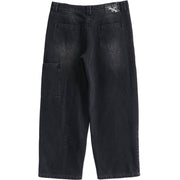Sunfaded black heavyweight baggy denim with chrome leather back patch by WOJO