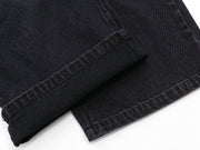 Sunfaded black heavyweight baggy denim with chrome leather back patch by WOJO