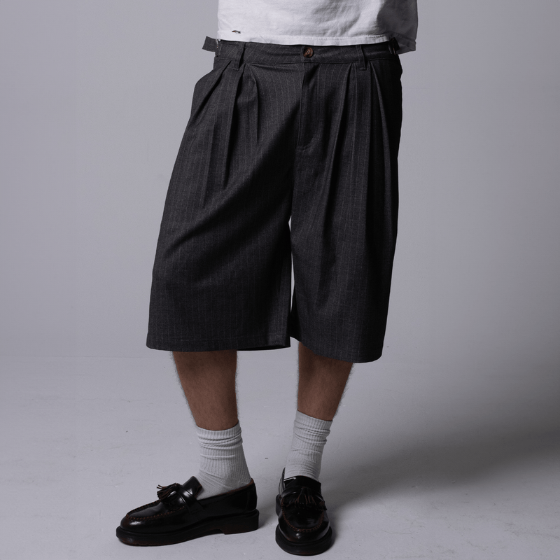 Black pinstripe wide-leg shorts in heavyweight rayon twill by WOJO