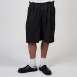 Black pinstripe wide-leg shorts in heavyweight rayon twill by WOJO