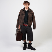 Stone-washed denim jorts with wine red stitching and chrome leather patch by WOJO