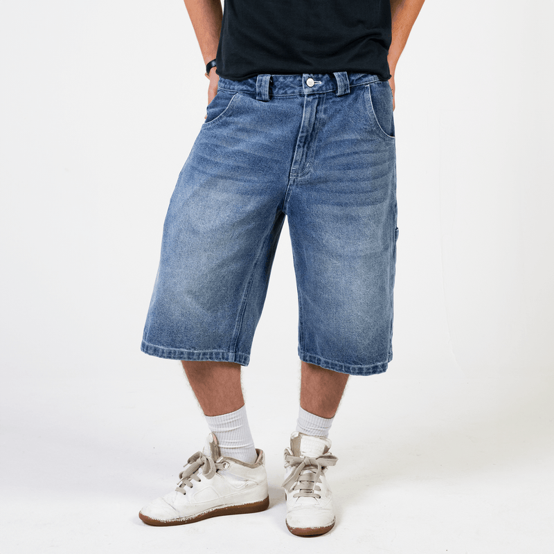 Blue heavyweight denim jorts with chrome leather patch by WOJO