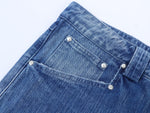 Vintage blue textured slub denim jeans with a relaxed fit by WOJO