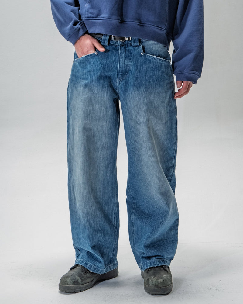 Vintage blue textured slub denim jeans with a relaxed fit by WOJO
